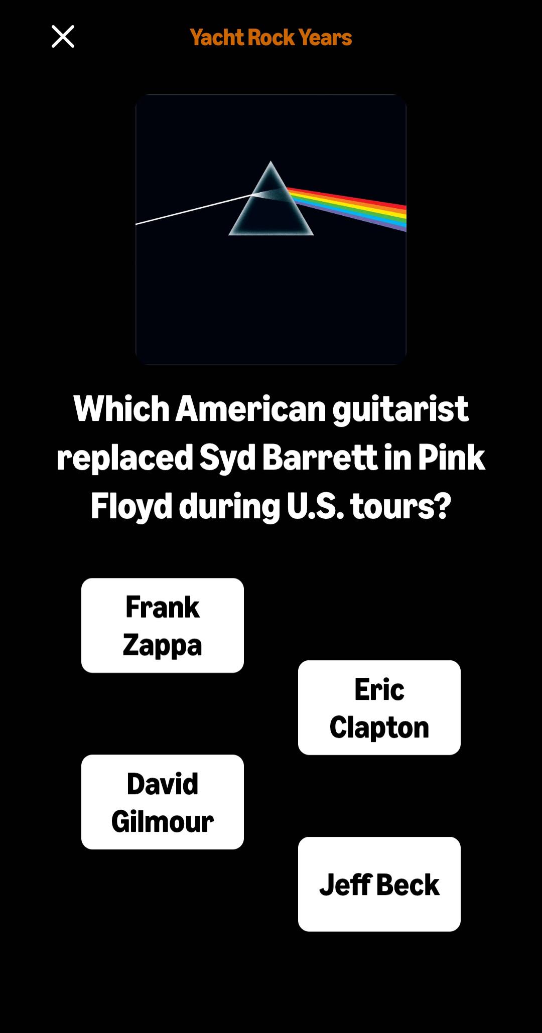 A FanQuest trivia question screen — Yacht Rock Years theme, asking 'Which American guitarist replaced Syd Barrett in Pink Floyd during U.S. tours?' with four answer chips (Frank Zappa, Eric Clapton, David Gilmour, Jeff Beck) on a black background.